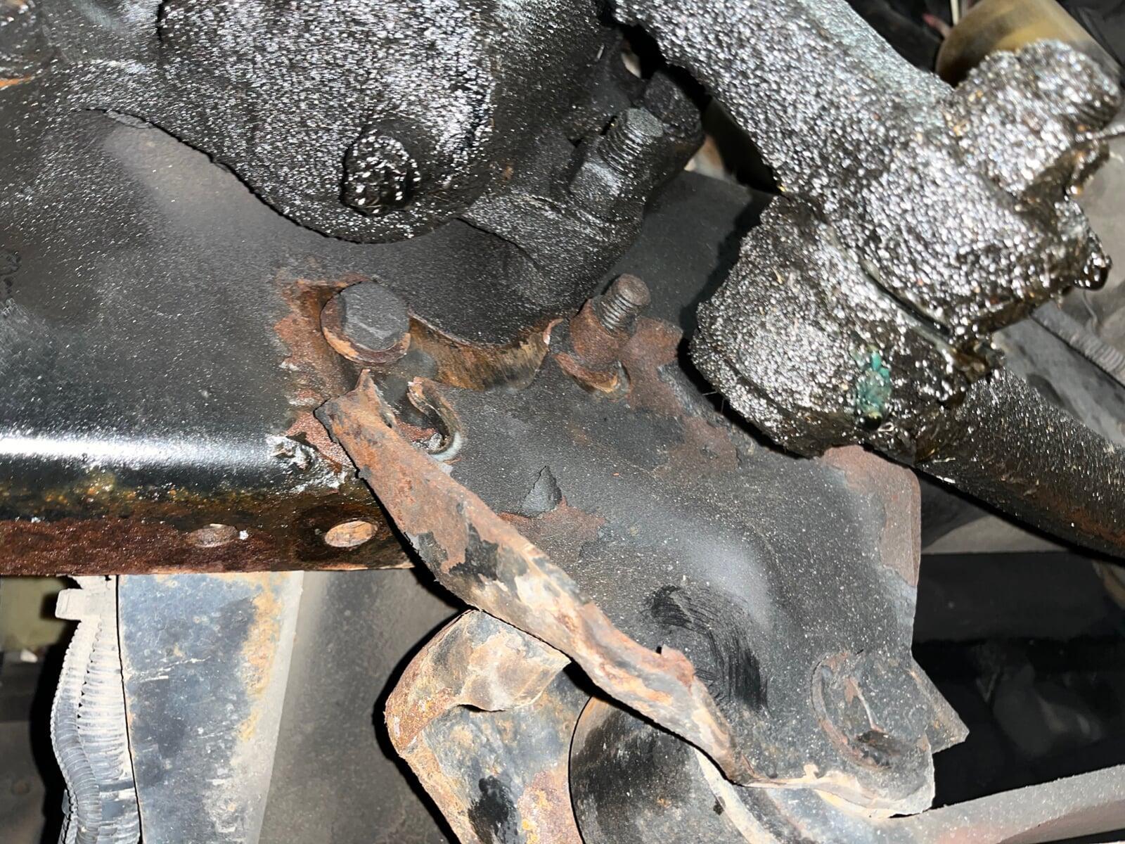Leaf spring shackle hanger damage causing front axle to move out of place.